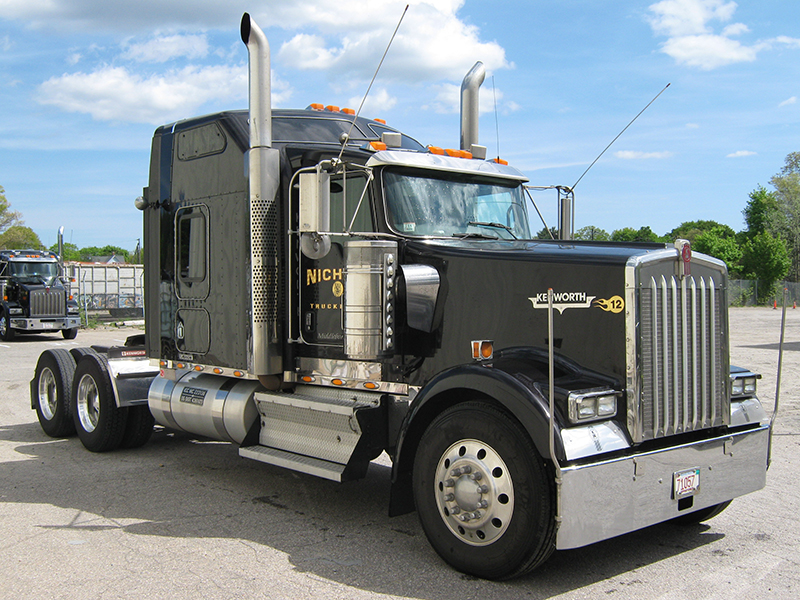 A black Nichols Kenworth tractor ready for an open-deck haul